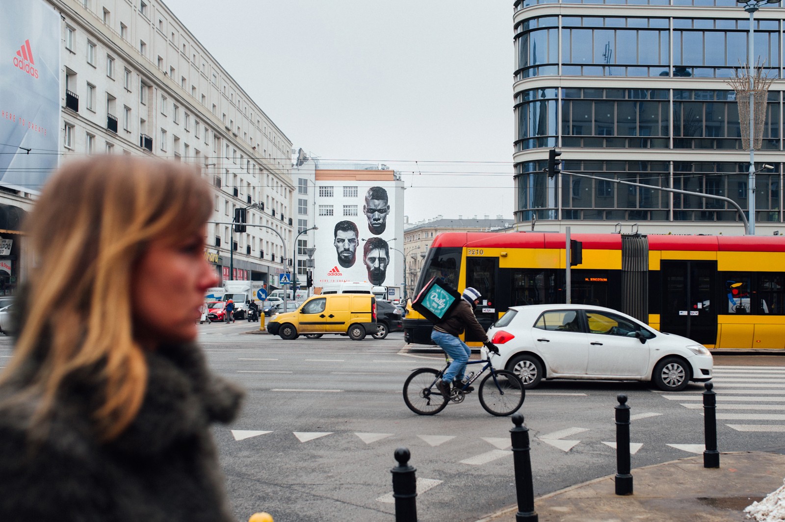 .View of the advertising mural from aleje jerozolimskie in warsaw with footballers | Adidas - Here to Create | Portfolio