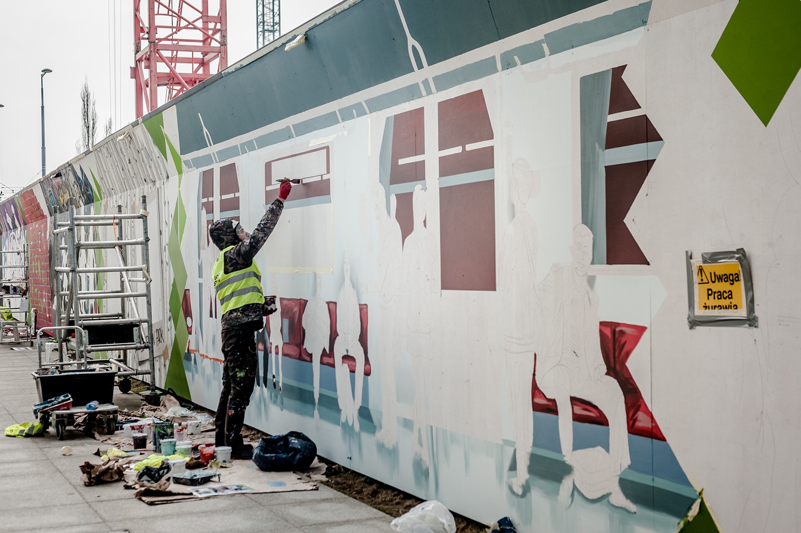 Malarz maluje mural dla dewelopera Skanska w Warszawie | Generation Park | Portfolio