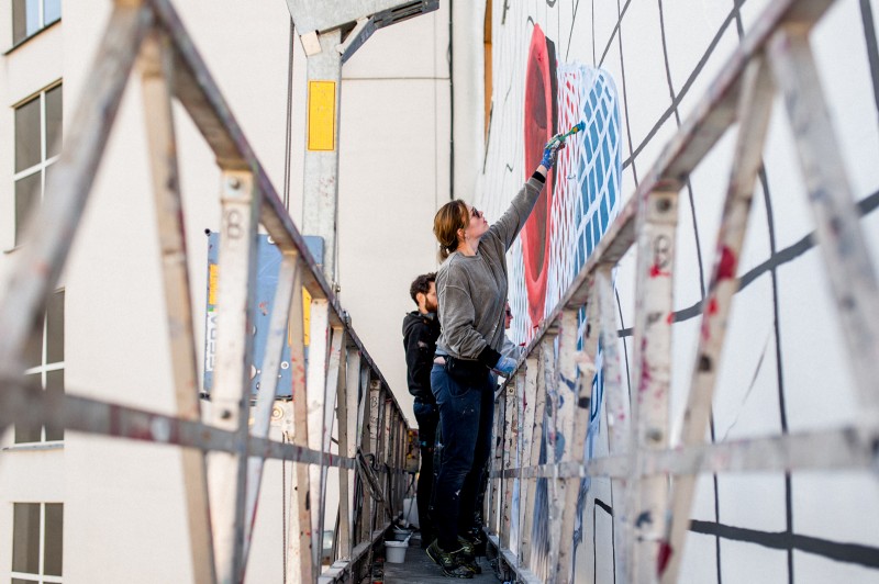 Painters on scaffolding painting Adidas advertisment  | Adidas Deerupt | Portfolio