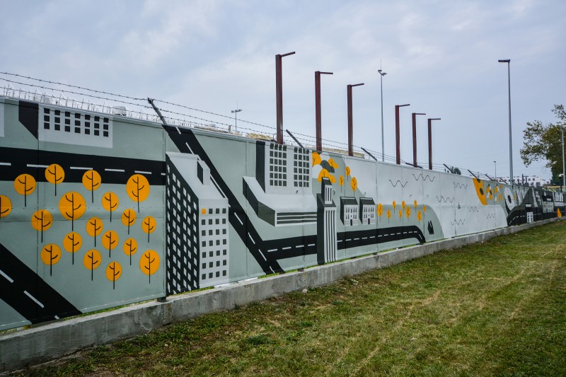 Mural namalowany na plocie MZA w Warszawie | Miejskie Zakłady Autobusowe | Portfolio