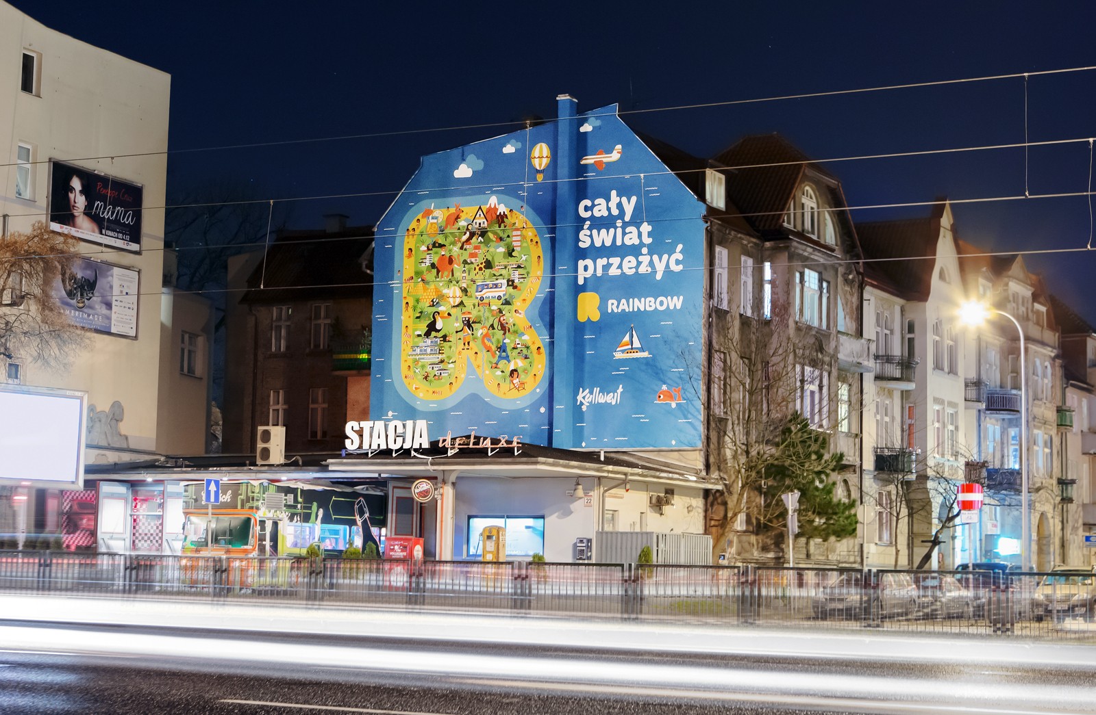 Mural reklamowy Rainbow w Gdańsku ul. Bohaterów Getta | Kampania dla biura podróży Rainbow | Portfolio