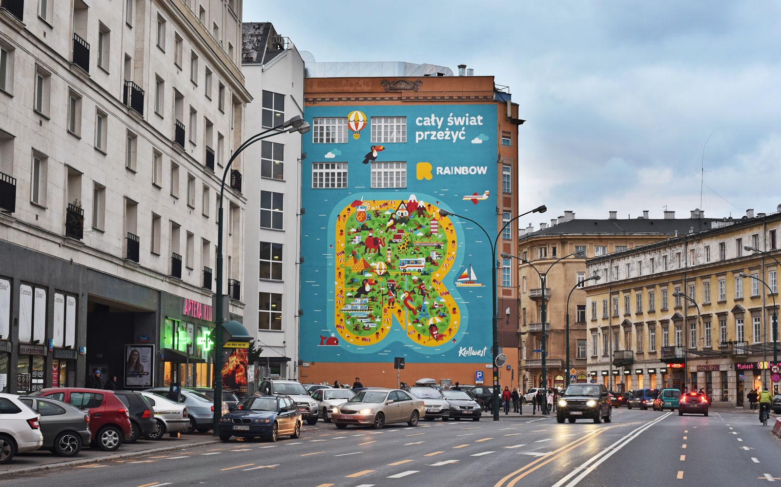 Mural reklamowy Rainbow w Warszawie - ul. Bracka - Dom Towarowy Braci Jabłkowskich | The whole world experience | Portfolio
