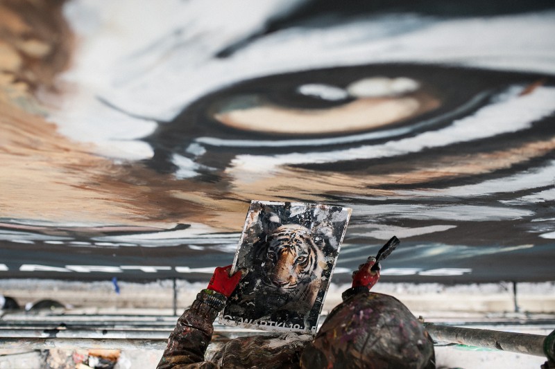 Photorealistic mural with animals for BBC Earth in Warsaw | The Dynasties | Portfolio