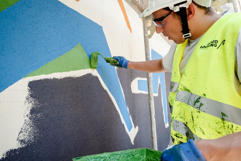 Ręczne malowanie muralu na zlecenie firmy SKANSKA projektu Dawida Ryskiego | Mural zaprojektowany przez Dawida Ryskiego - SKANSKA | Portfolio