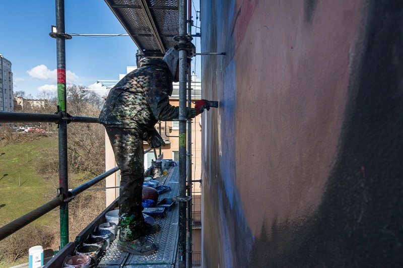 Ręcznie malowana reklama YSL w Warszawie | Lenny Kravitz | Portfolio