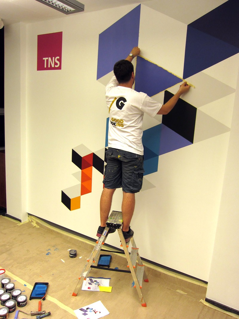 Wall Design malowanie wnętrza TNS Polska w Recepcji | Ręcznie malowane grafiki we wnętrzu siedziby TNS Polska | Portfolio